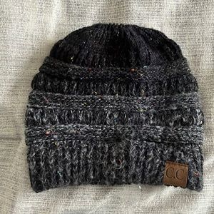 C.C. Beanie with hole for ponytail at the top. Navy/black/purple